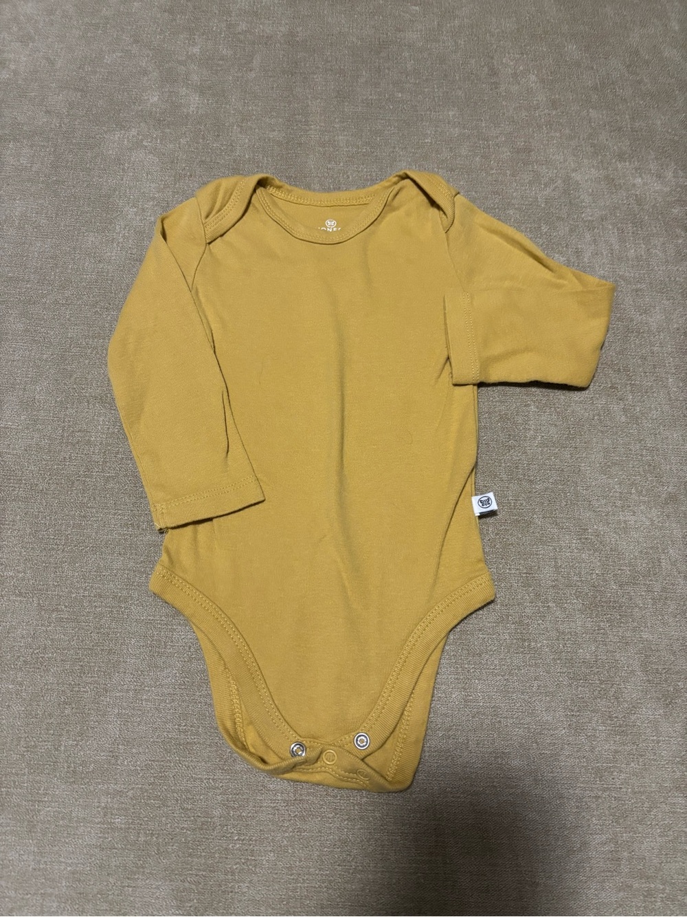 The Honest Company Mustard Long-Sleeve Baby One-Piece